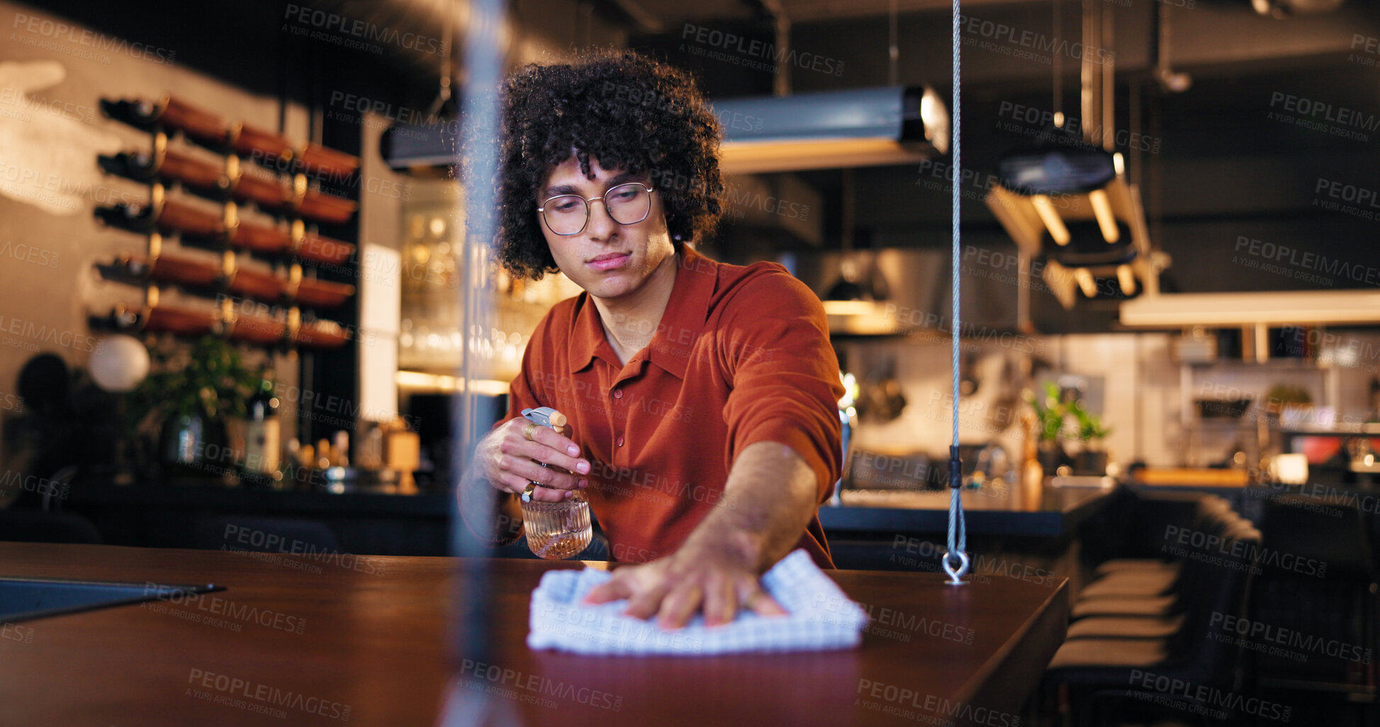 Buy stock photo Cleaning, waiter and man with spray, bar and chemical for hygiene, routine and sanitation for germs. Small business, disinfection and person with liquid for dirt, bacteria and maintenance at night