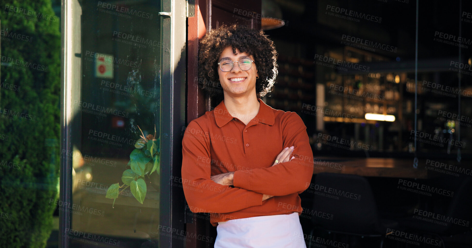 Buy stock photo Pub, portrait and waiter with arms crossed at door for friendly welcome, hospitality and waiting. Server, small business and man with smile at entrance for customer service and ready for happy hour