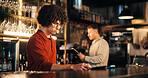 Business, man and bartender in restaurant, tablet and digital app for inventory, counter and internet. People, employees and hospitality with technology, alcohol or customer service with drinks order