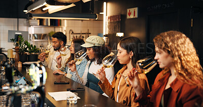Buy stock photo Restaurant, friends and smell glass at wine tasting for experience, flavor preparation and bonding. Night, people and alcohol aroma at pub venue for quality testing, weekend break or social gathering