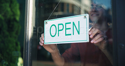 Buy stock photo Happy person, hands and window with open sign in cafe for startup or ready for business. Storefront, signage or owner with poster, welcome or message for hospitality, advertising or service in shop