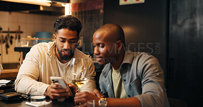 Buy stock photo Alcohol, friends and men with phone in restaurant for social media, online message and conversation. Nightclub, talking and people with wine, drinks and smartphone for reunion, hangout and weekend