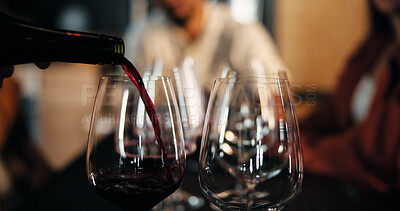 Buy stock photo Bartender, glasses and wine with bottle for fine dining, alcohol or hospitality in restaurant. Closeup, group or liquid brew with friends, get together or social event for drink, toast or celebration