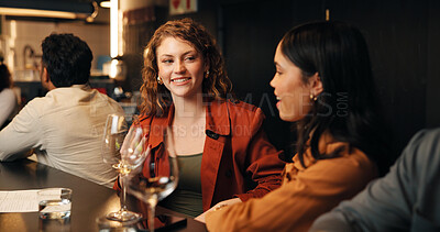 Buy stock photo Wine, restaurant and women at bar talking for networking, discussion and bonding on night out. Happy hour, friends and people hangout with alcohol in conversation, chatting and relax on weekend
