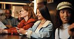 Happy, friends and women with phone in restaurant for social media, message and networking. Nightclub, talking and people on smartphone for gathering, hangout and online dating app on weekend