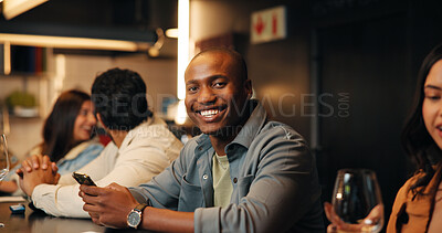 Buy stock photo Happy, portrait and man with phone in restaurant for social media, online message and conversation. Bar, pub and people with alcohol drinks on smartphone for mobile app, text and internet on weekend