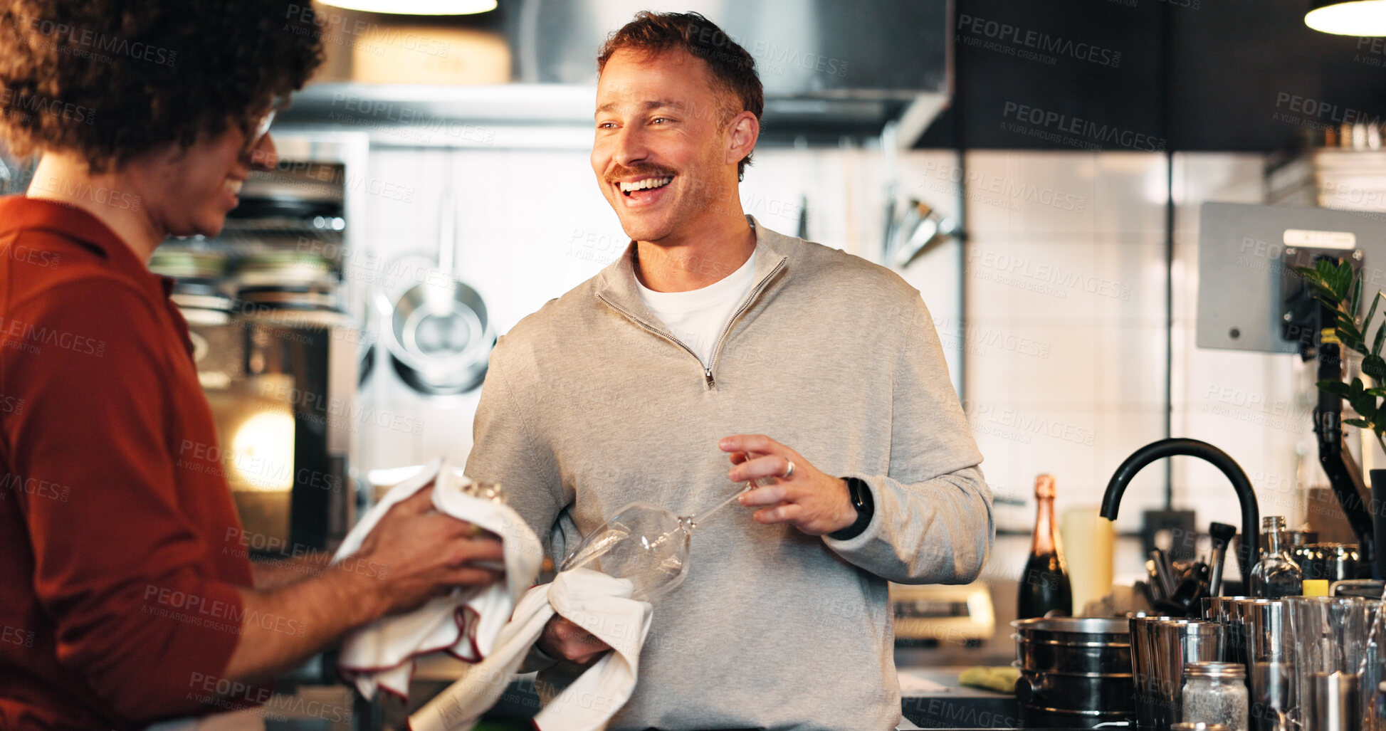 Buy stock photo Smile, bartenders and men in restaurant, cleaning glass and funny with conversation. People, employees and friendly service with hospitality, discussion and pub workers with hygiene, joke and cloth