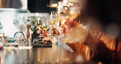 Buy stock photo Hands, friends and people with swirling at wine tasting to enhance experience, flavor and process. Group, social event and stir alcohol glass at restaurant to release aroma, soften tannins or bonding