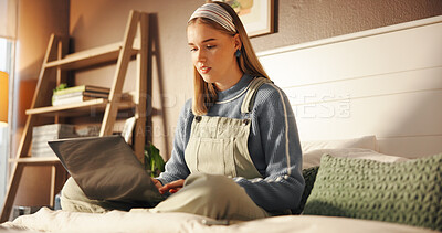 Buy stock photo Woman, relax and typing on laptop on bed for internet browsing, streaming service and reading blog. House, person and technology in bedroom for online dating site, social media update and research