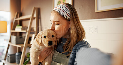Buy stock photo Selfie, kiss and relax with woman and puppy for social media post, pet influencer and love. Dog content creator, photography POV and golden retriever with person in home for animal care and trust