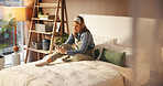 Happy, bedroom and above of woman with phone for social media, online networking and message. Apartment, morning and person relax on smartphone for internet, scroll website and mobile app on weekend