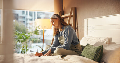 Buy stock photo Writing, notebook and reminder with student in bedroom for study, assignment due date and course. University planning, gpa progress and academic calendar with woman in home for college grades