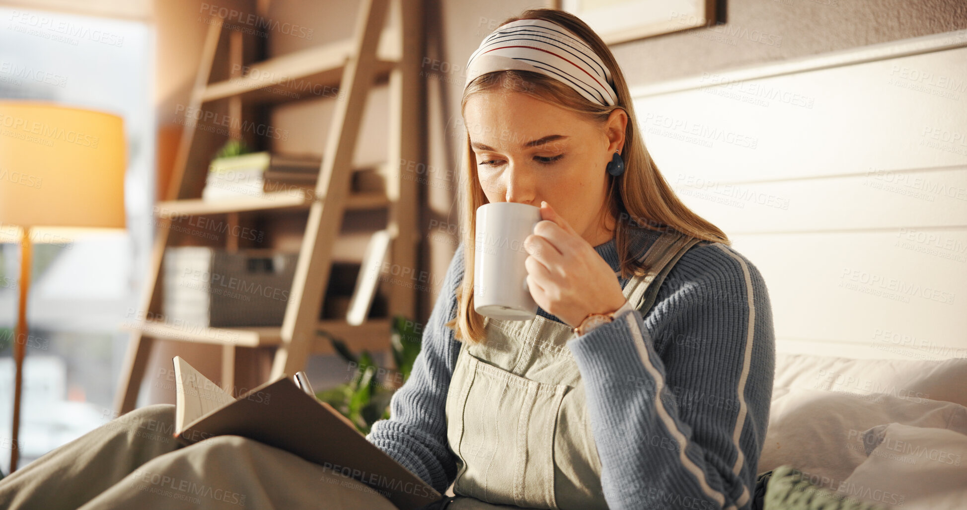 Buy stock photo Coffee, reading and woman with book on bed for morning on weekend with literature knowledge. Cappuccino, relax and female person with self help story, novel or chapter in bedroom at apartment.