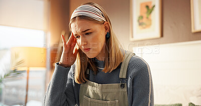 Buy stock photo Student, stress or girl with headache in home for college loans, financial debt or scholarship risk. Mental health, anxiety or person with tension migraine for university workload, fatigue or burnout