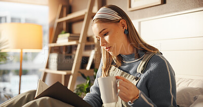 Buy stock photo Coffee, reading and woman with book in bedroom for morning on weekend with literature knowledge. Cappuccino, relax and female person with self help story, novel or chapter on bed at apartment.