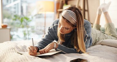 Buy stock photo Home, girl and writing in notebook on bed for academic planning, study calendar and to do list. Personal diary, person or taking notes in bedroom for exam preparation, weekend productivity or planner