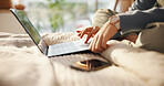 Laptop, hands and woman on bed with relax for freelancer career with creative project online. Technology, contact and person with computer for email communication with remote work in bedroom in home.