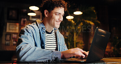 Buy stock photo Night, remote work and man with laptop, coffee shop and email marketing on web, research and online. Working late, copywriter and person with tech for article, cafe and smile for freelance project