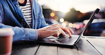 Buy stock photo Hands, laptop and typing with person at coffee shop for remote work or small business research. Computer, keyboard and planning with customer at outdoor cafe or restaurant as freelance employee