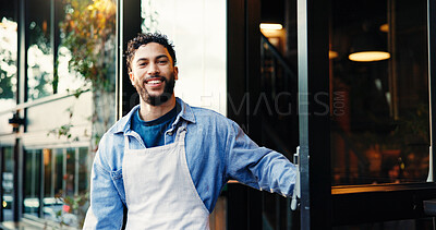 Buy stock photo Happy, man and portrait of waiter at coffee shop entrance for welcome, customer service or job. Smile, confident and male server with confidence for hospitality industry at doorway of restaurant.