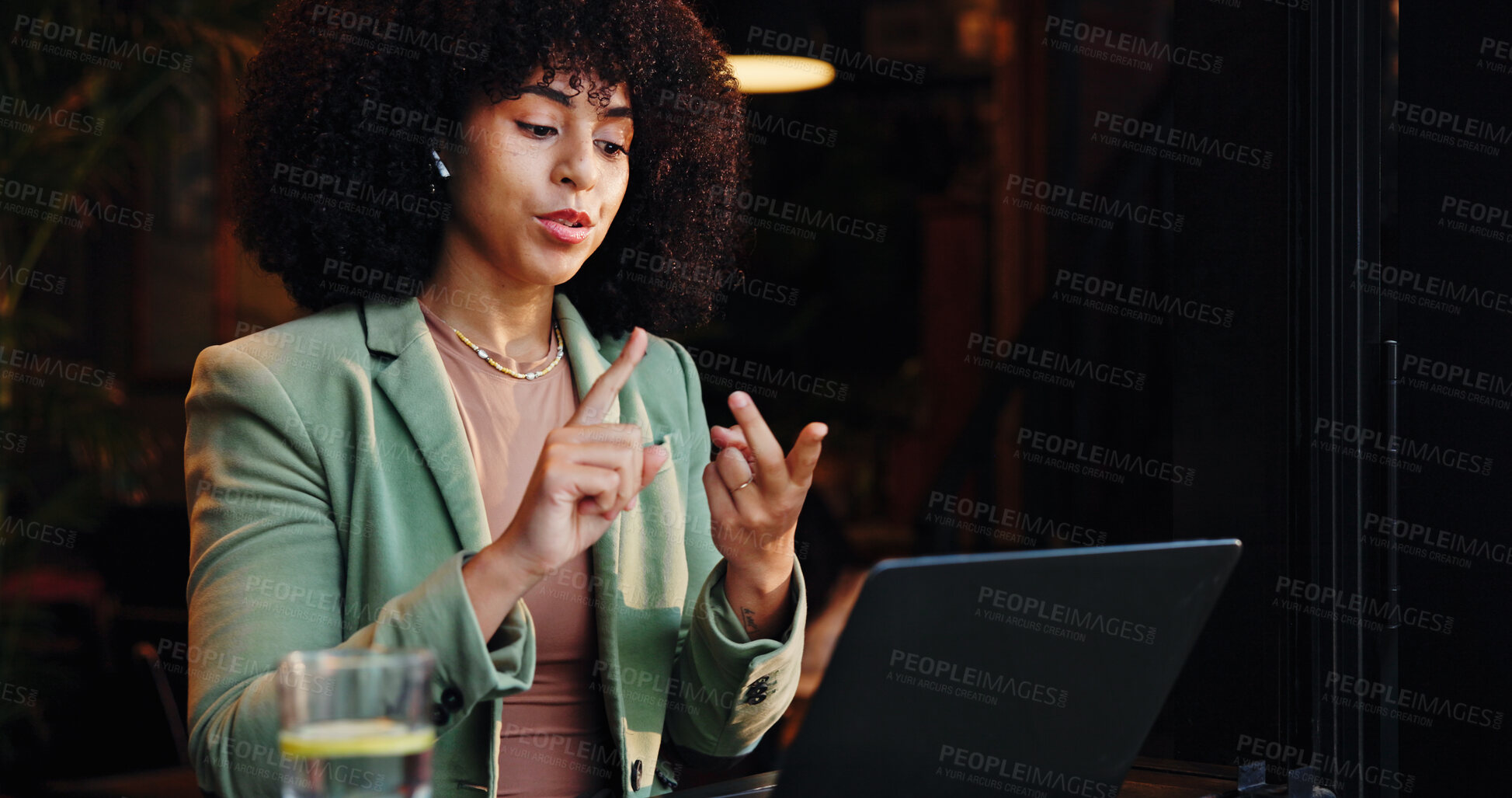 Buy stock photo Laptop, remote work and video call with woman in coffee shop for online presentation or planning. Computer, explain and virtual meeting with African employee in restaurant for feedback or review
