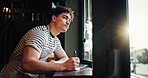 Thinking, barista and man writing notes in cafe for inventory list, stock or planning menu. Reflection, coffee shop or small business owner with journal for ideas, sales checklist or vision by window