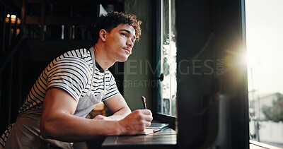 Buy stock photo Thinking, barista and man writing notes in cafe for inventory list, stock or planning menu. Reflection, coffee shop or small business owner with journal for ideas, sales checklist or vision by window