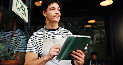 Buy stock photo Entrance, tablet and thinking with man in coffee shop for online booking or reservation management. App, doorway and ideas with waiter in cafe or restaurant for hospitality or small business startup