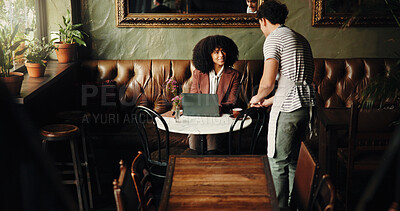 Buy stock photo Woman, waiter and service with remote work at coffee shop, happy and customer experience with order. People, server and smile with laptop, discussion and help with beverage, tea or drink at cafeteria