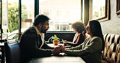 Buy stock photo Happy, date and couple holding hands in restaurant for bonding, romance and together in cafe. Love, relax and man with woman to celebrate anniversary, relationship and connection in conversation