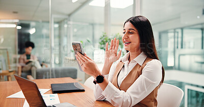 Buy stock photo Phone, video call and wave with business woman in office for accounting or finance update. App, greeting and virtual meeting with Indian accountant at desk in workplace for financial communication