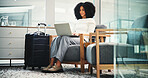 Airport, woman and laptop for business trip, communication or email for travel plans research. Happy, employee and person with luggage for journey, networking and waiting for flight in lounge