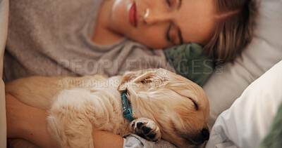 Buy stock photo Puppy dog, sleeping and woman in home bedroom for rest, nap and relax with comfort of pet owner. Tired puppy, animal adoption and insurance with trust, security and dream on bed in apartment