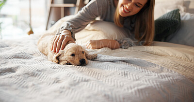 Buy stock photo Home, dog and woman in bedroom, smile and bonding together with happiness, relax and care. Apartment, pet owner and person with puppy, companion and kindness with domestic animal and adoption