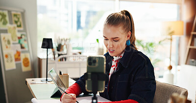 Buy stock photo Influencer, smartphone and woman in studio, artist and content creation with creative project. Home, person and freelancer with cellphone, live streaming and graphic designer with process and talent