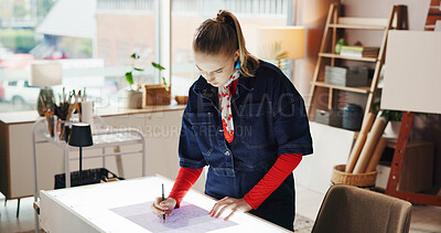 Buy stock photo Drawing, illustration and light box with woman in studio apartment for remote work or sketch. Art, design and paper with freelance employee in home office for craft process or creative industry