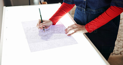 Buy stock photo Woman, hands and sketching with light table for fashion design, art or tracing in home studio. Female person, artist or clothing designer with pencil for illustration, draft or planning in workshop