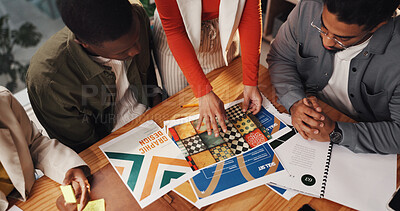 Buy stock photo Hands, graphic designer and documents with team at office with review, above or project management. Person, group and problem solving for marketing proposal, meeting or inspiration at creative agency