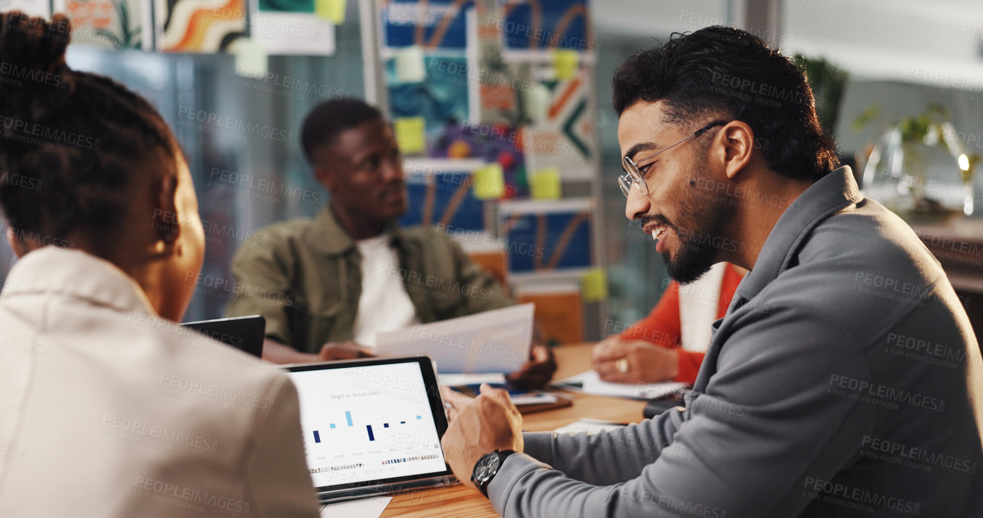 Buy stock photo Man, woman and graphic designer with tablet, meeting and review charts for project management at startup. People, tech and team with graphs, talk and application ux with advice at creative agency