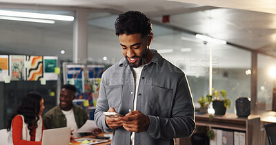 Buy stock photo Smile, phone and reading with business man in office for social media manager, communication and research. Online branding, networking and marketing campaign with person in creative agency for web