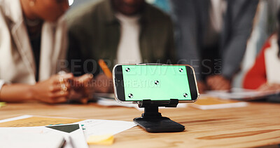 Buy stock photo People, phone and green screen with stand for app advertising or marketing on office desk. Group, employees or mobile smartphone display for digital UI, web design or UX on mockup space in workplace