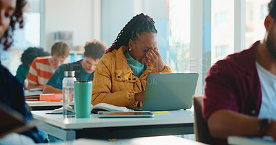 Buy stock photo Woman, college student and headache in classroom for education, stress or laptop at academy. Girl, fatigue and migraine with pain, burnout or brain fog for test, assessment or mistake at university