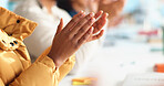 Hands, applause and students with celebration in classroom, books and education goals at college. People, clapping and success with cheers for achievement, report and scholarship at university