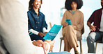 Documents, people and support with mental health, information and feedback in meeting. Group, pamphlet and men with women, discussion and depression with wellness, stress relief and psychology