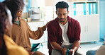 Sad man, support group and empathy with understanding for rehabilitation, help or assistance. Male person, emotion and colleagues with sympathy for difficult time or team building moment in workplace