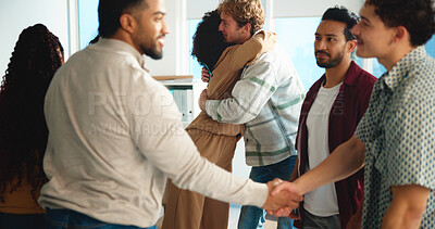 Buy stock photo Students, handshake and congratulations in classroom, college and happy for education goals. People, men and women with hug, shaking hands or support for success, achievement or results at university