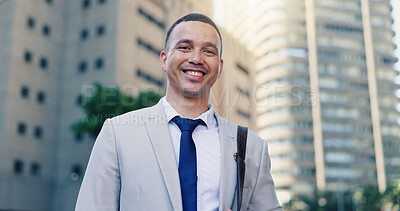 Buy stock photo Man, portrait and smile on business trip in city with bag, pride and low angle for commute to workplace. Person, happy and outdoor in urban town with confidence, travel and confident in Colombia