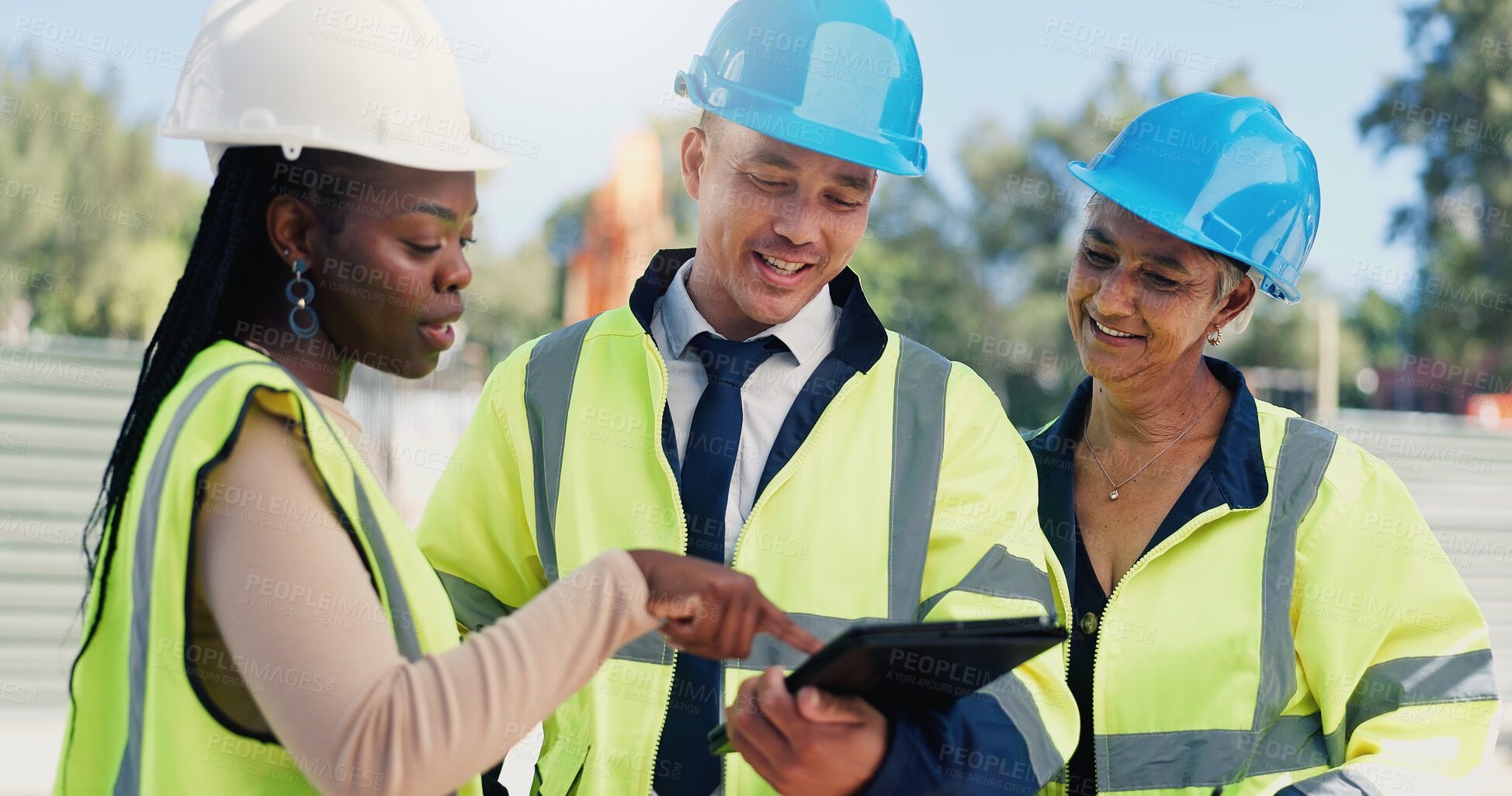 Buy stock photo Man, architect and team with tablet at construction site with talk, point and infrastructure development. People, technician or engineer with smile, app and feedback for property expansion project