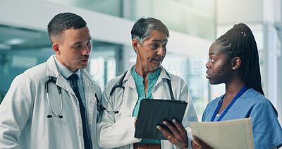 Buy stock photo Doctors, woman and tablet with team, discussion and insight with medical research at hospital. Healthcare professional, group and leader with app, report or review with info for solution at clinic