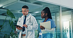 Team, doctor and nurse with tablet for healthcare discussion, planning schedule or telehealth. Medical collaboration, man and woman with tech for wellness report, diagnosis and feedback in clinic